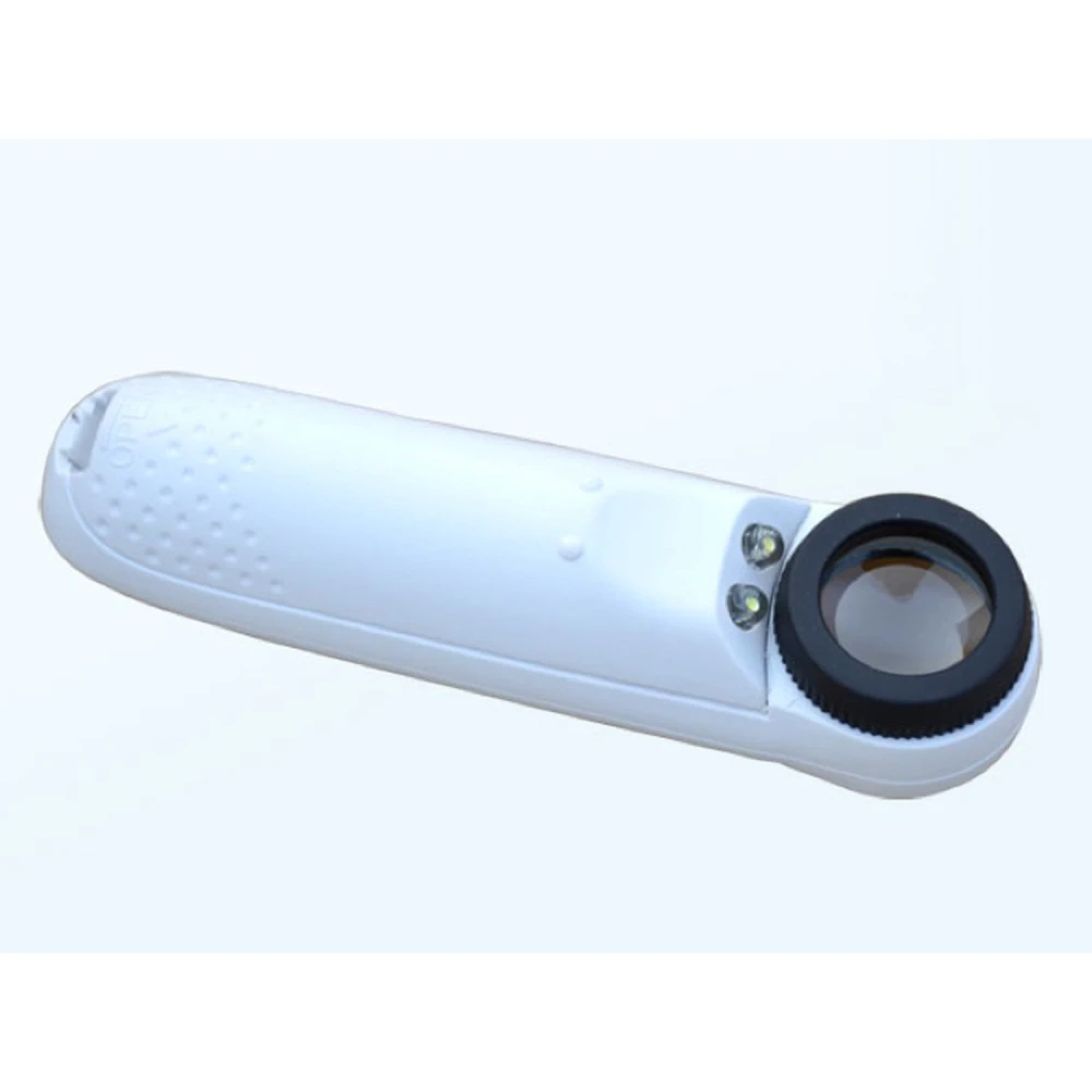 Detalle de lupa con luz LED para electrónica y joyería